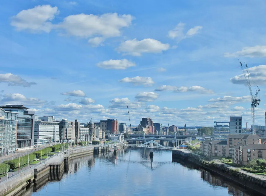 The River Clyde running through Glasgow with the Tradeston bridge and city buildings